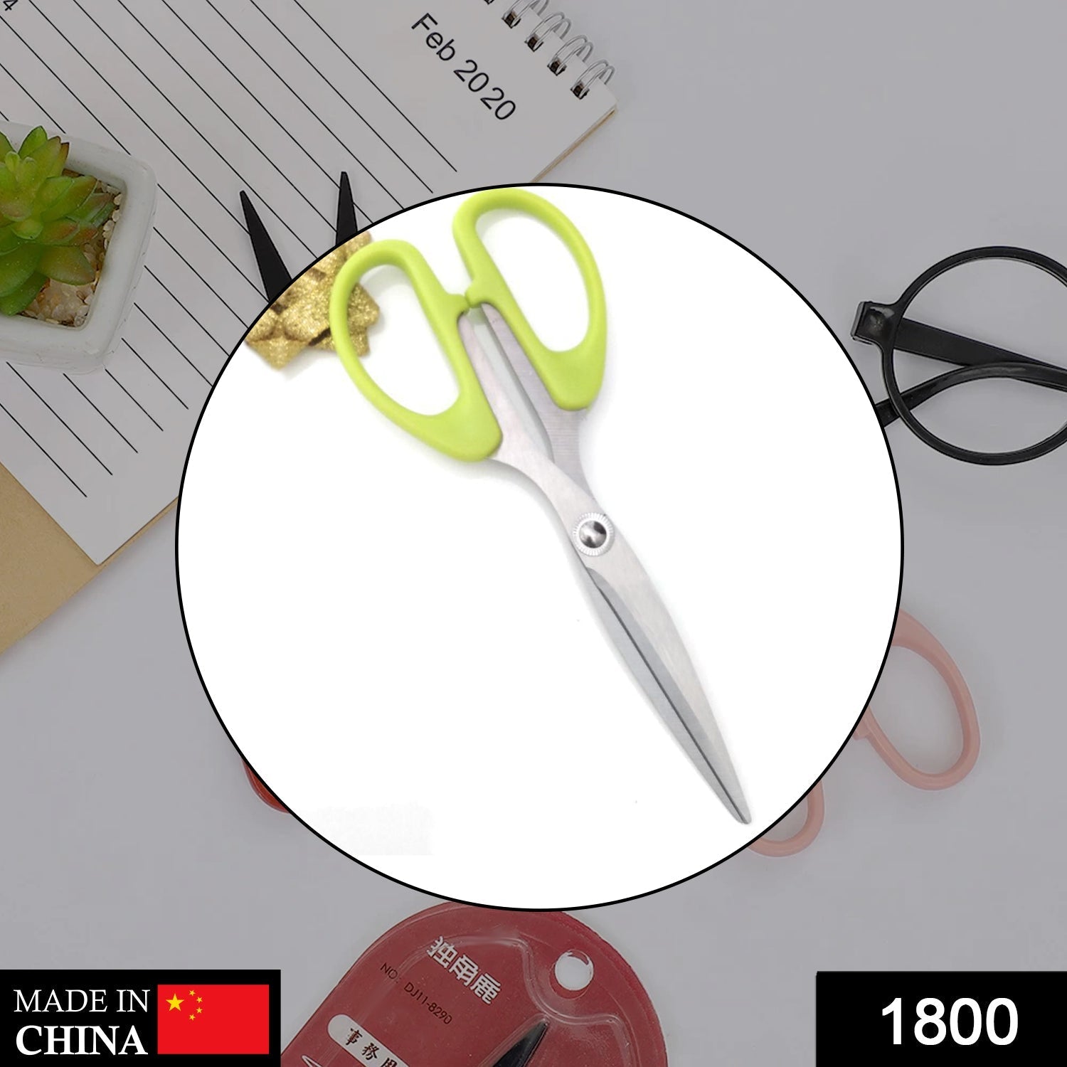 the stainless steel scissors, highlighting the plastic handle grip and sharp blades the stainless steel scissors, highlighting the plastic handle grip and sharp blades